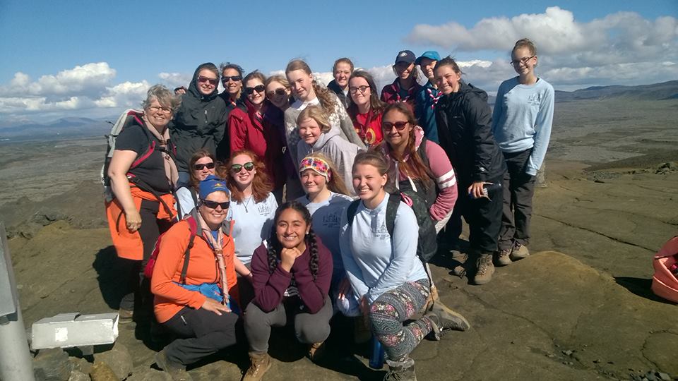 Travel troop group photo on top of helgafell